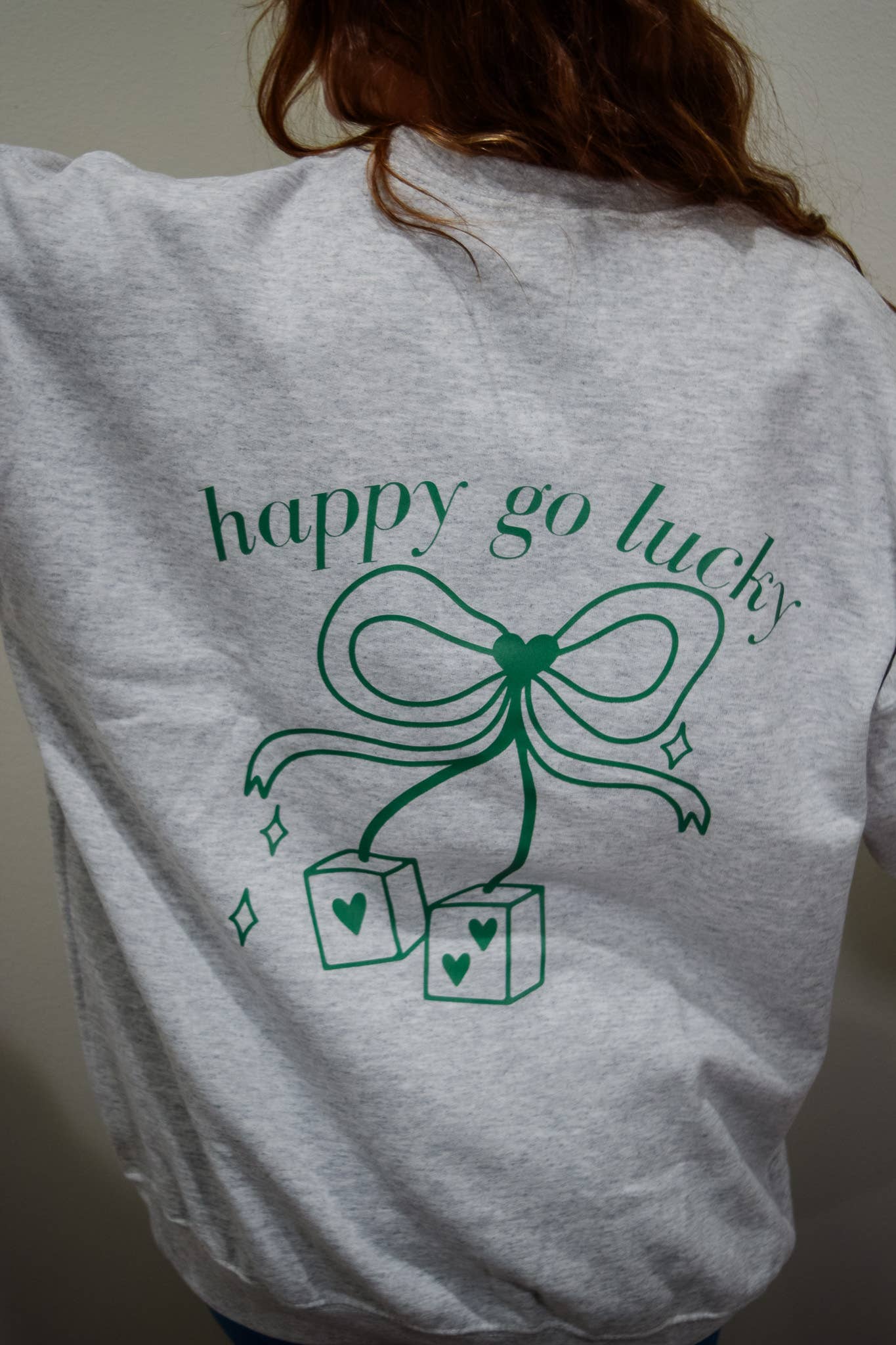 Happy Go Lucky Graphic Sweater
