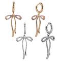 14K Dipped Ribbon Bow Shape Cz Huggie Earrings