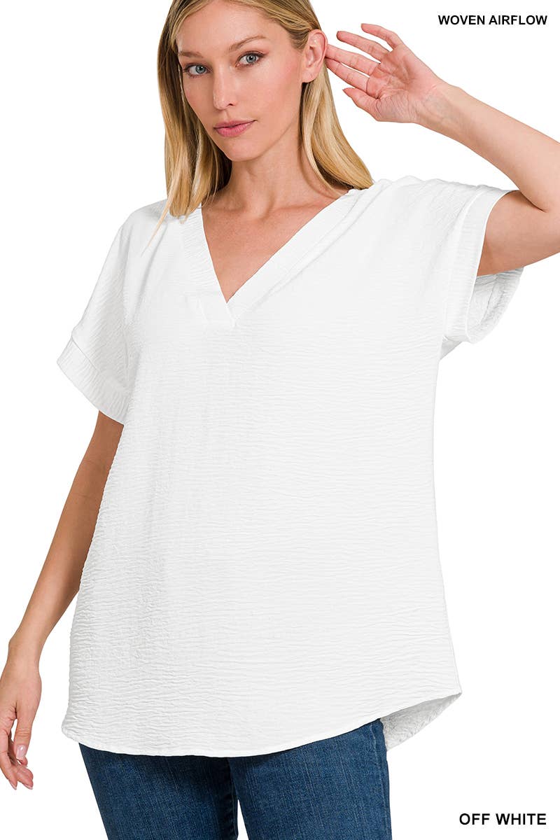 ..SI-24080 Woven Airflow V-Neck Hi-Low Hem Top