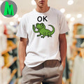 Lizard Hitting Button On Shirt Unisex