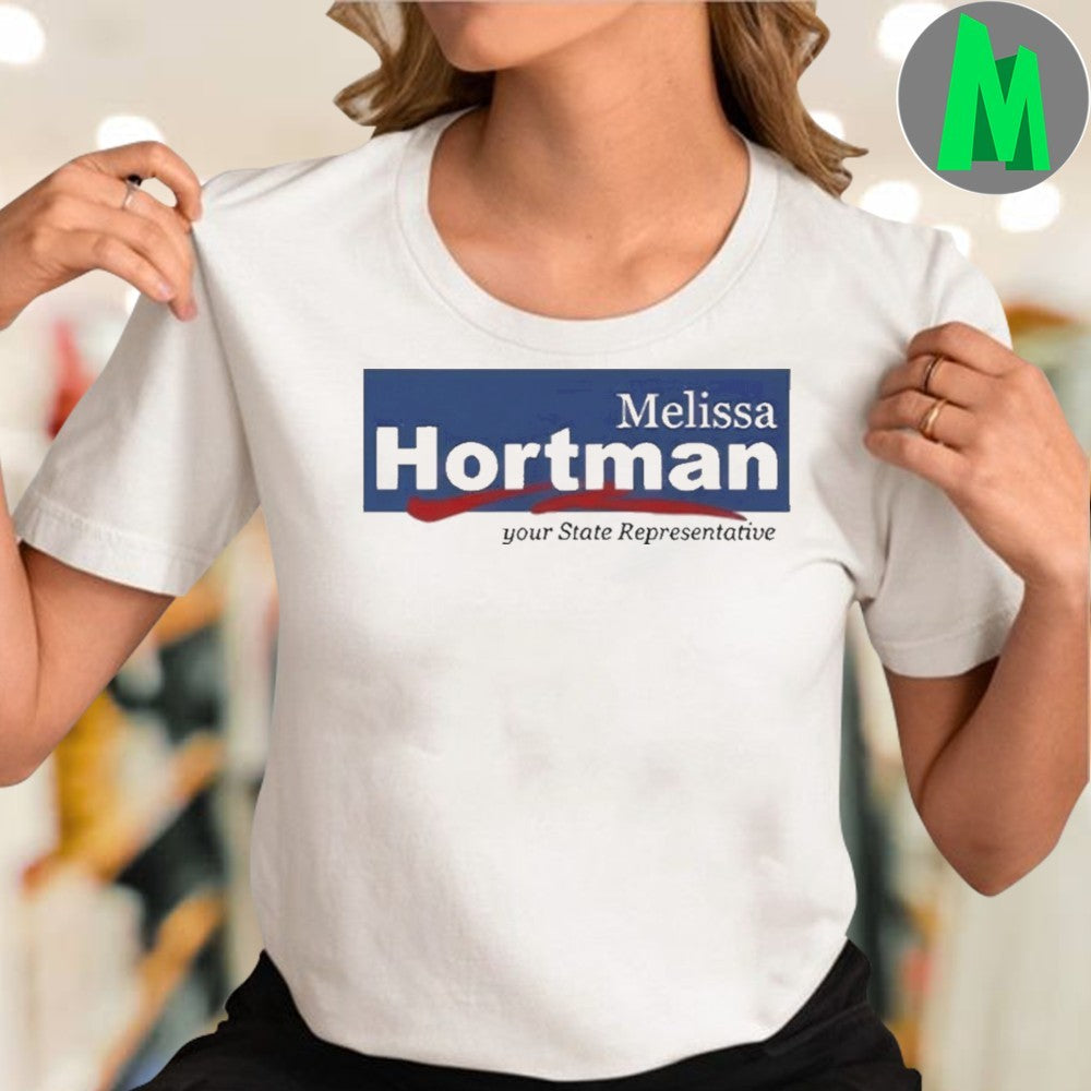 Tim Walz and his wife Gwen wore matching Melissa Hortman shirts to march in the Twin Cities Pride Parade