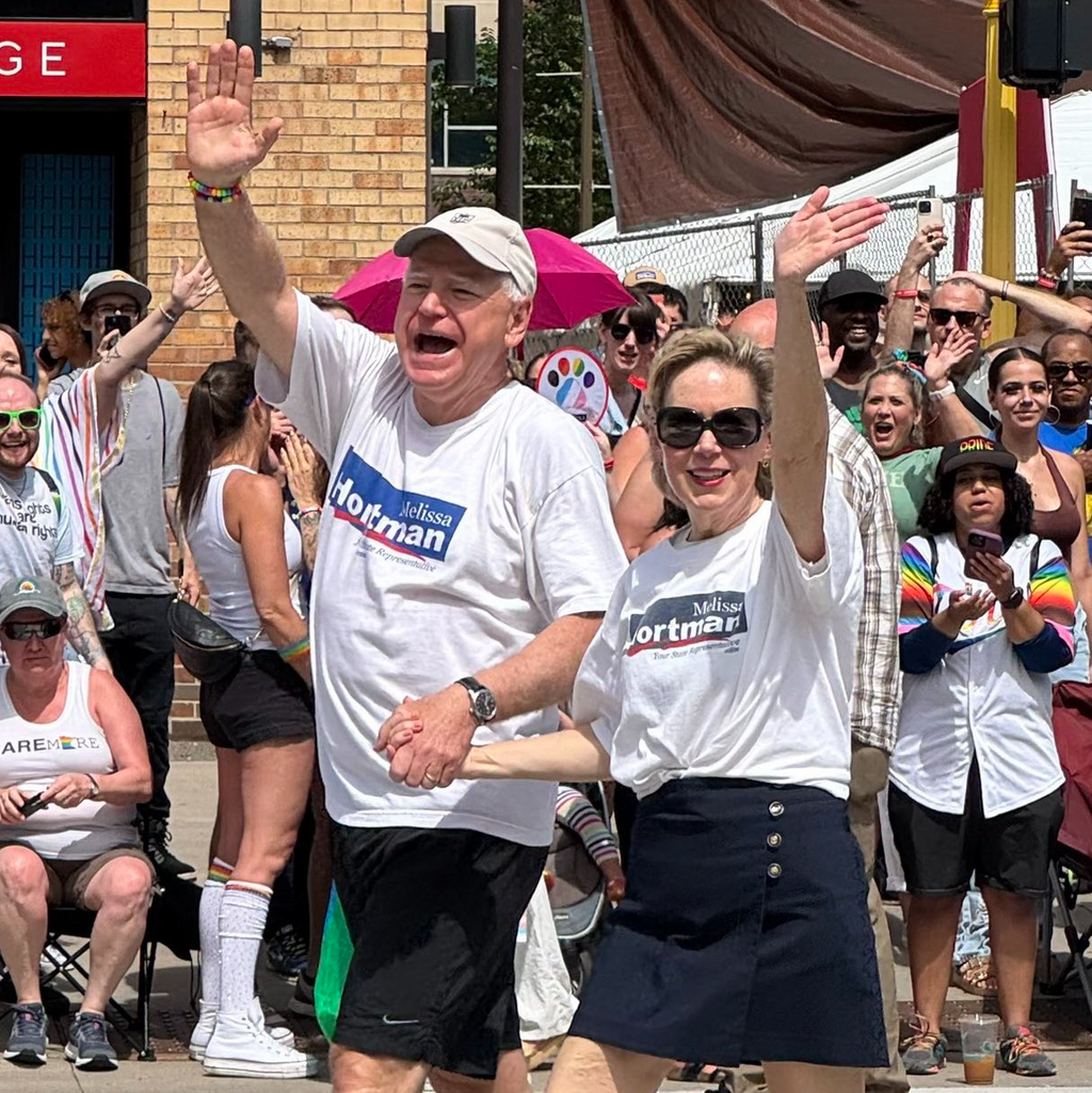 Tim Walz and his wife Gwen wore matching Melissa Hortman shirts to march in the Twin Cities Pride Parade