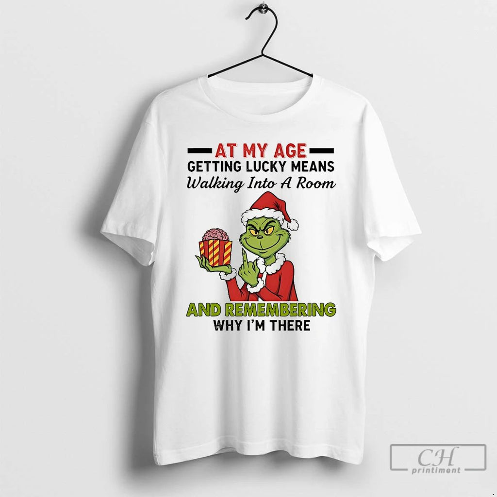 Premium Funny Grinch Santa Hat At My Age Getting Lucky Means Walking Into A Room Unisex